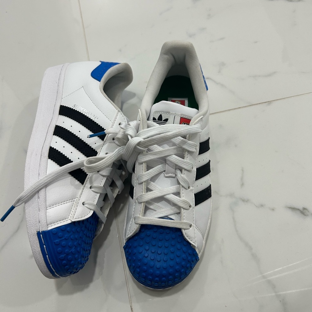 Adidas Kids White and Black Sneakers with Blue Accents
